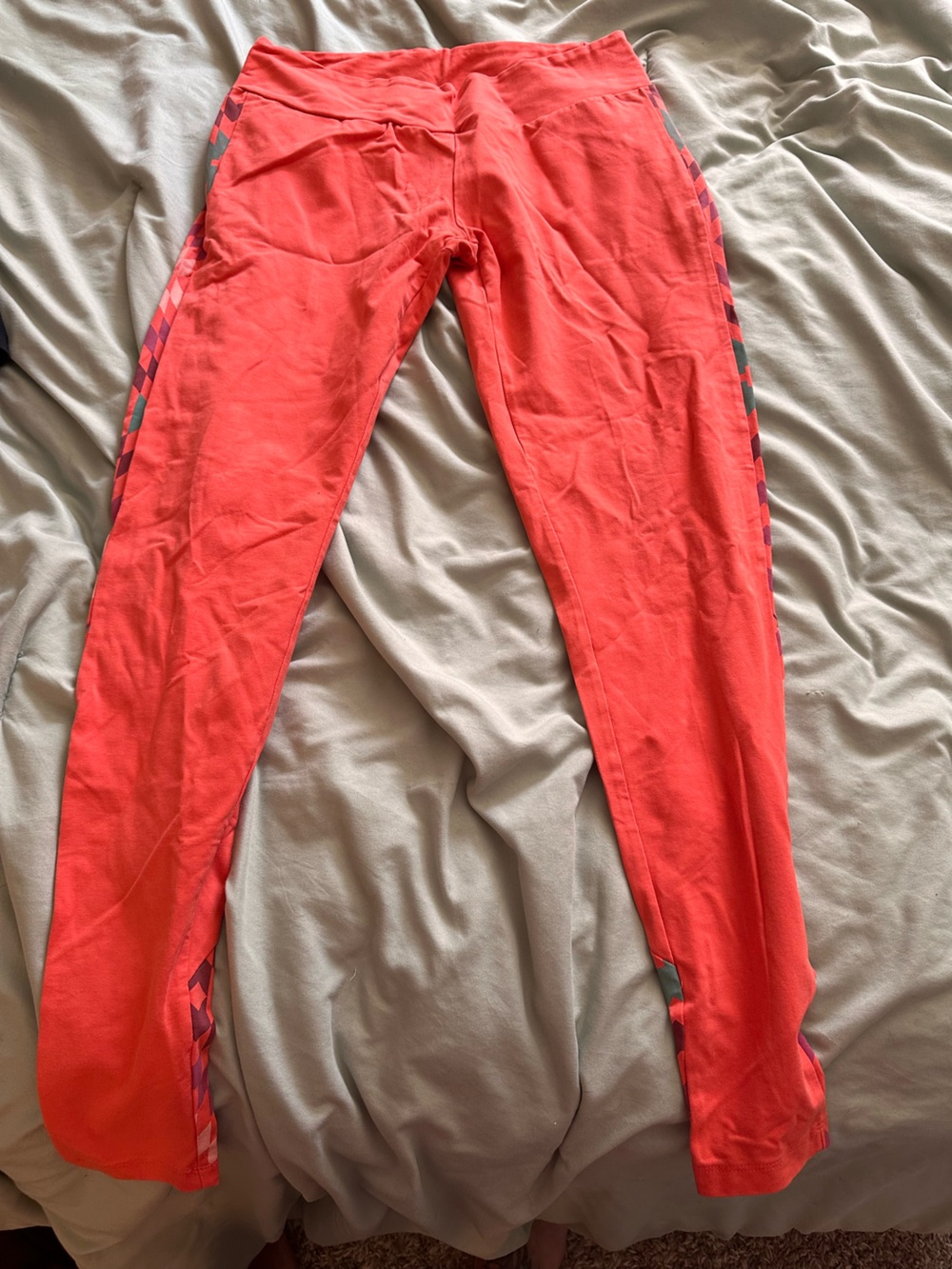 Synergy Organic Clothing Coral-Red Leggings with Geometric Print Side Trim